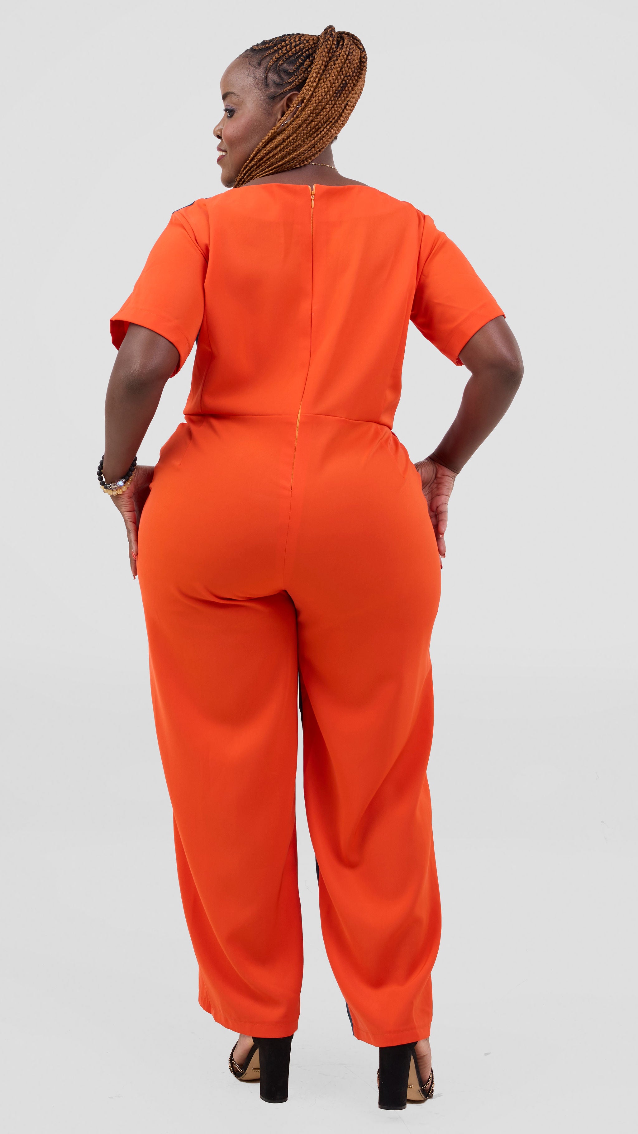 ZOSA Sunset Muse Jumpsuit ,bold orange and teal colorblock design. — view 2