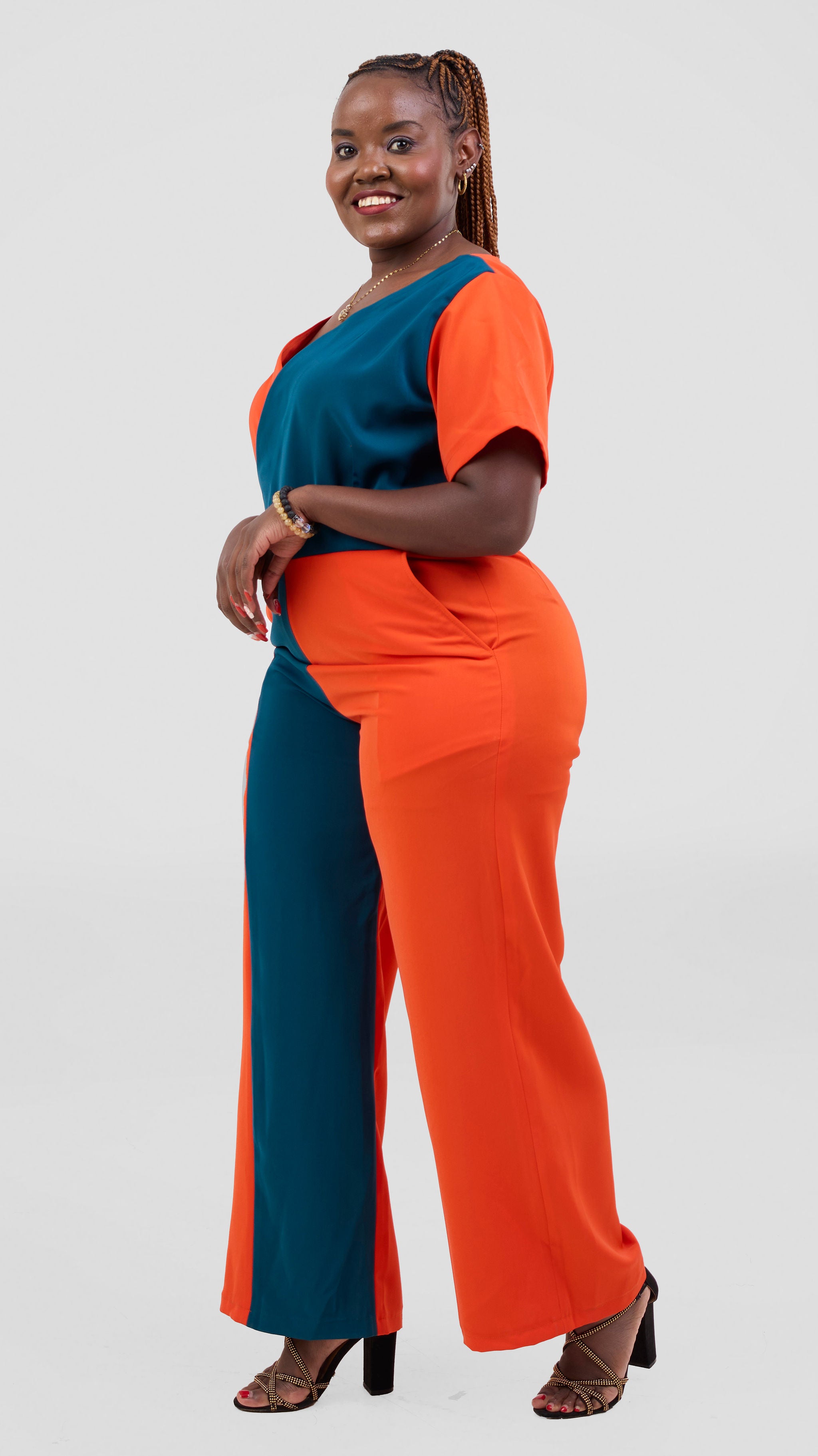 ZOSA Sunset Muse Jumpsuit ,bold orange and teal colorblock design. — view 3
